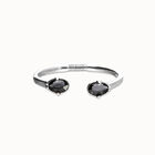 Bangle bracelet with two oval faceted black crystals